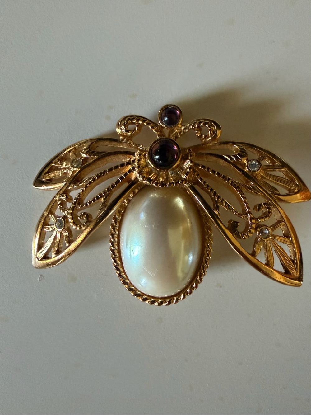 Avon Vintage Gold-Tone Bee Brooch with Pearl Cabochon and Purple Accents